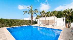 House overlooking the sea and sunset in Ibiza Cala Vadella