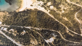 Superb plot for 2 Villas with 900m2 in Cala Moli with licence for sale