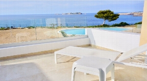 Recently renovated townhouse in first sea line in Cala Tarida