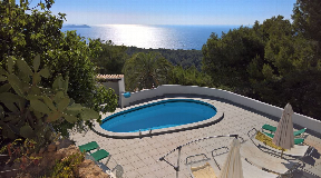 Hillside villa with a sea view with sunset for sale