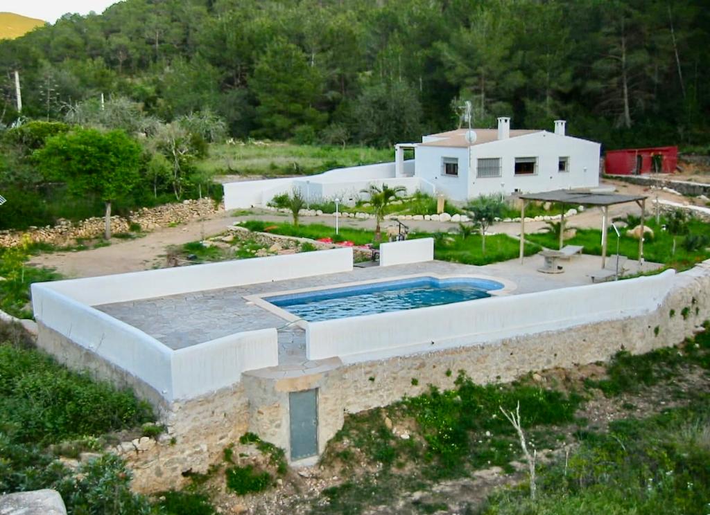 Amazing 2 Bedrooms cottage on a 85.000 sqm woodland by Benirras for sale