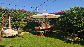 Cosy chalet at the edge of Santa Eulalia with exotic garden for sale