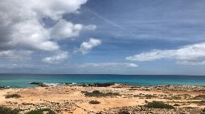Serenity by the Sea: Luxurious Coastal Villa in Es Caló, Formentera