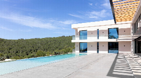 Luxurious four bedroom villa in Cas Mut with stunning ocean views for sale